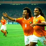 수리남의 유명한 축구 선수와 스포츠 스타 - A dynamic action shot of two legendary Dutch-Surinamese football players, Ruud Gullit with his iconi...